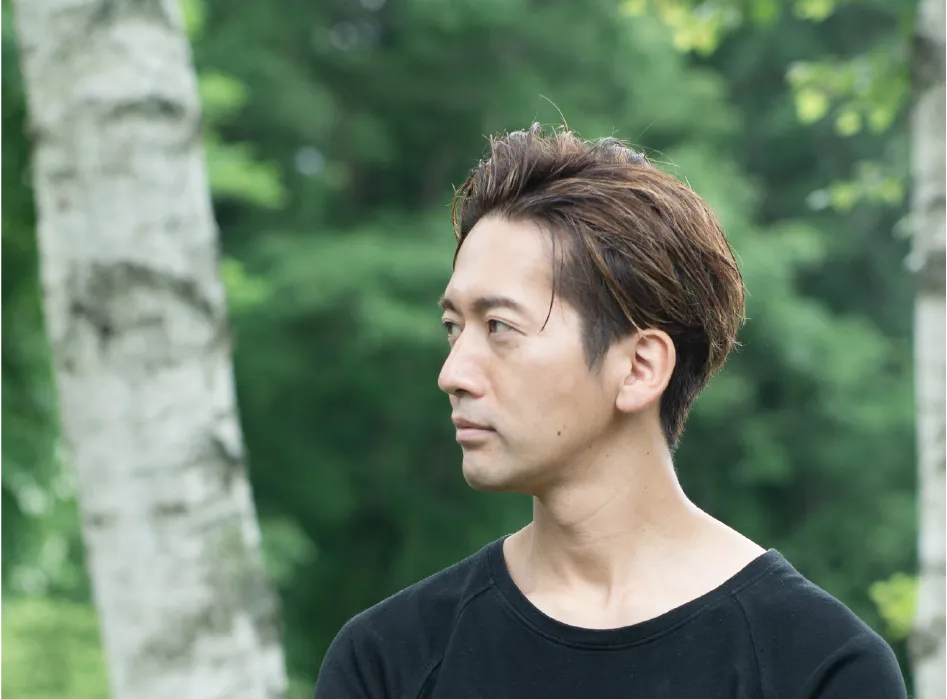 津田 賀央